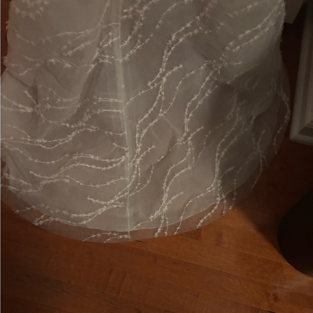 Mira Zwillinger Marvel
Elegant White Strapless Wedding Dress - Picture 15 of 16